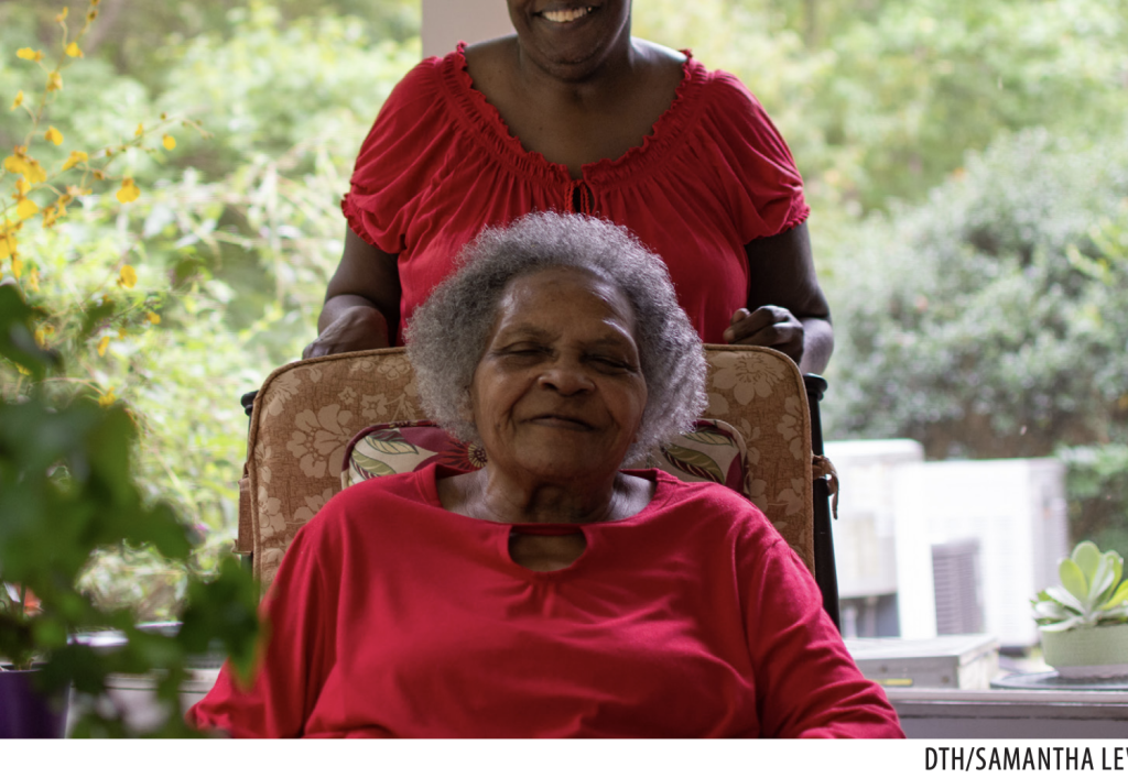 Barbara Ann (standing) and Barbara E (sitting) a mother-daughter duo who both lived in the Covenant Place assisted care facility. The portrait was used in the Daily Tar Heel's special housing edition.